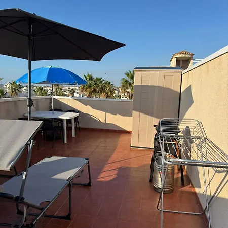 Altos Punta Prima Apartment *